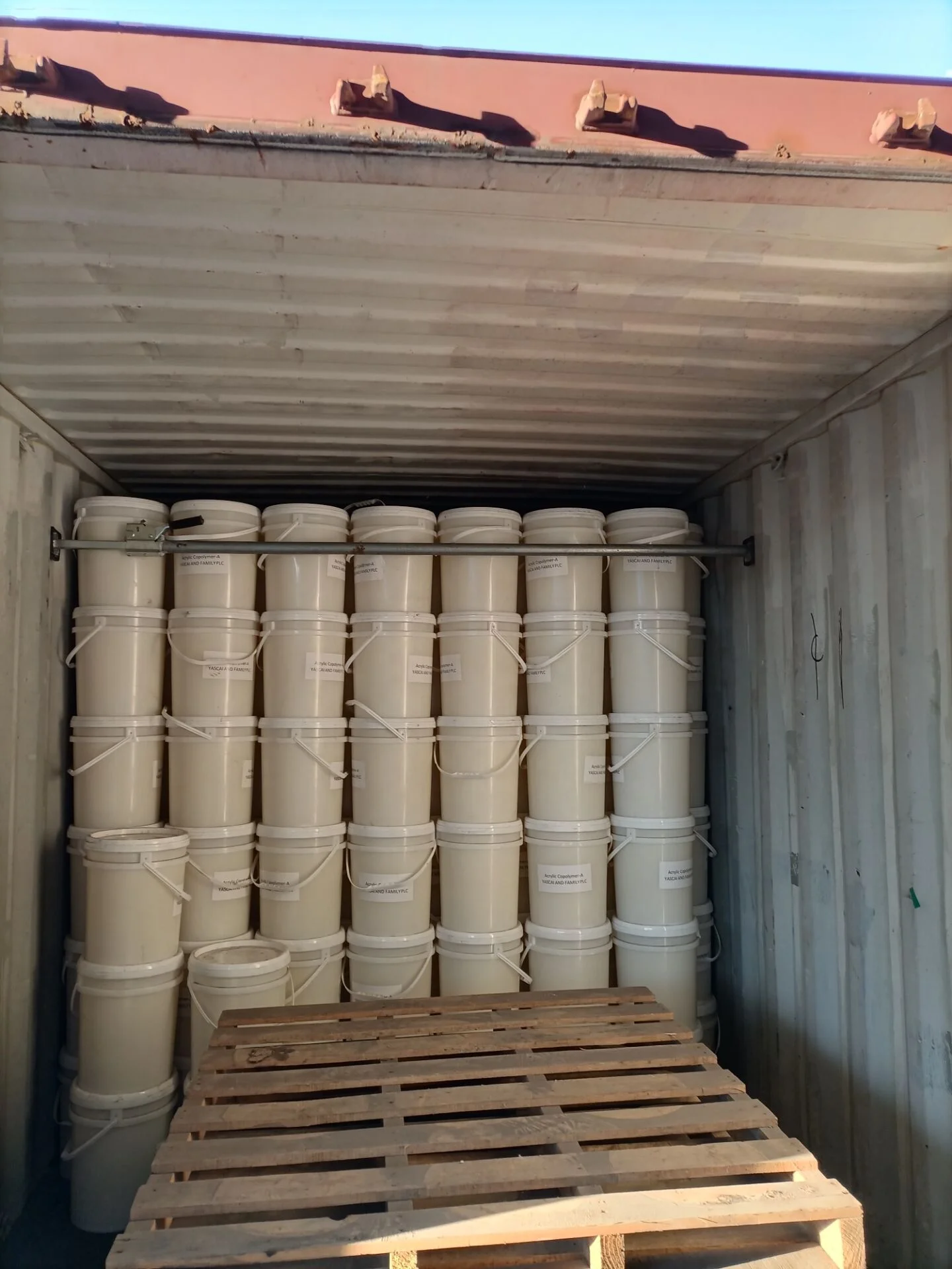 White pails prepared for container shipment